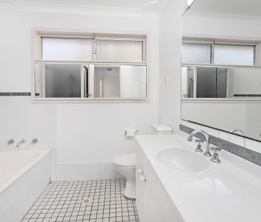 Relaxed Coastal Living in a Spacious Family Home - Photo 6