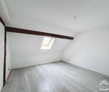 Appartement de 3.5 pièces dans les combles - Photo 1