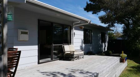 Tidy Three-Bedroom Home with Great Outdoor Living - Photo 2