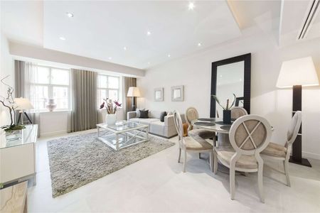 An exceptional two bedroom located close to Harrods with air conditioning and 24 hour porter. - Photo 3