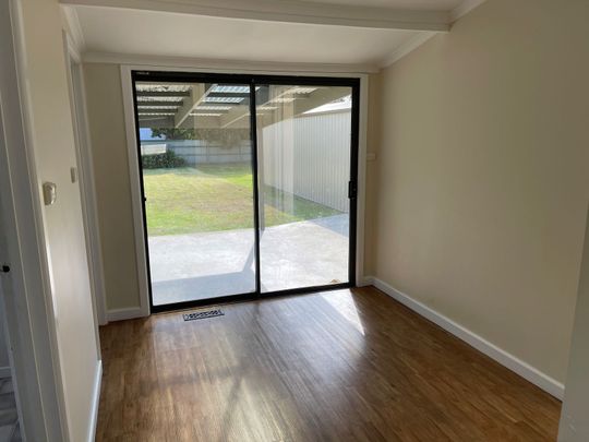 COMFORTABLE 3 BEDROOM HOME - Photo 1