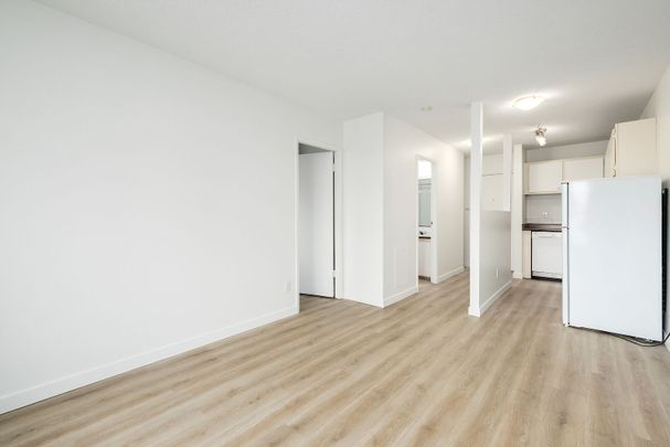 725 12 Avenue Southwest, Calgary - Photo 1