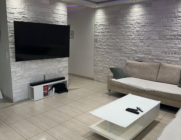 Hochwertige Wohnung mit Garten,Einbauküche, TG-Stellplatz - Photo 1