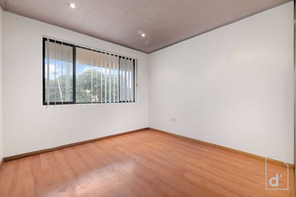 Centrally Located - Top Floor Unit - Photo 1