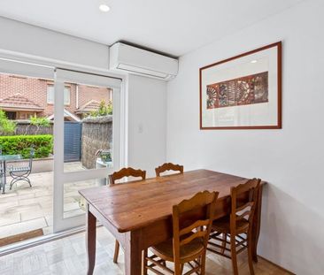 Bright and Spacious Townhouse with Private Courtyard & Double Garage - Photo 3