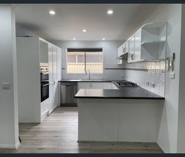 Spacious 3-Bedroom Home for rental - Close to M1 and Local Schools - Photo 2