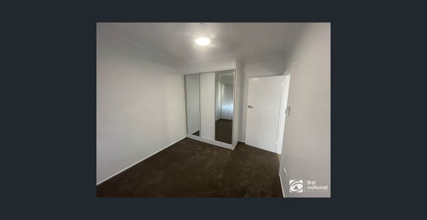 Recently renovated & centrally located unit in a small complex - Photo 1