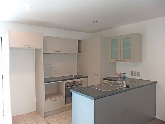 Townhouse Living in fully gated complex with 2 carparks - Photo 1