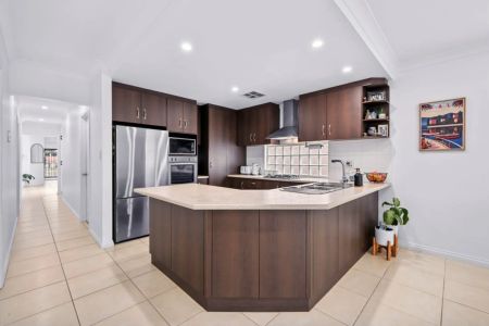 Spacious, Modern Elegance, and Perfectly Located Coastal Gem 3 Beds | 2 Baths | 1 Garage | - Photo 3