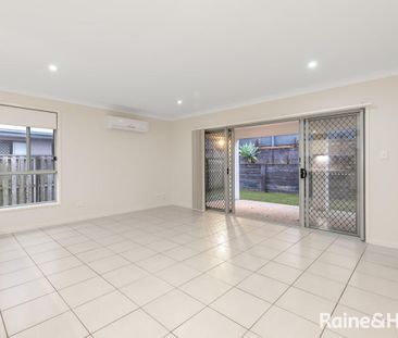 Beautifully Lanscaped Coomera Family Home - Photo 2