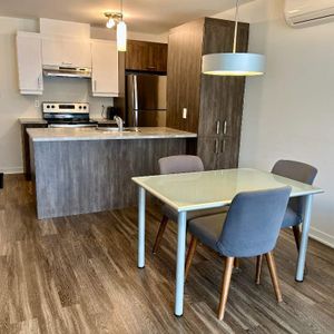 Magnifique 3 ½ + espace bureau TOUT INCLUS - lumineux - stationnement : 1535$/mois - Photo 2