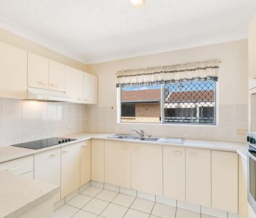 CONVENIENTLY LOCATED TWO-BEDROOM SECURE UNIT - Photo 4