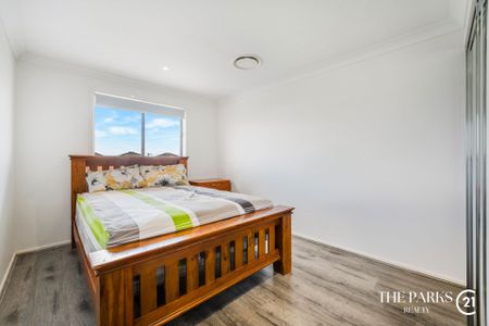 Ultra-Modern Family Home in the Heart of Marsden Park - Photo 5