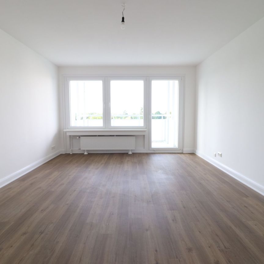 Modernes Flair in grüner Wohnanlage! - Foto 1