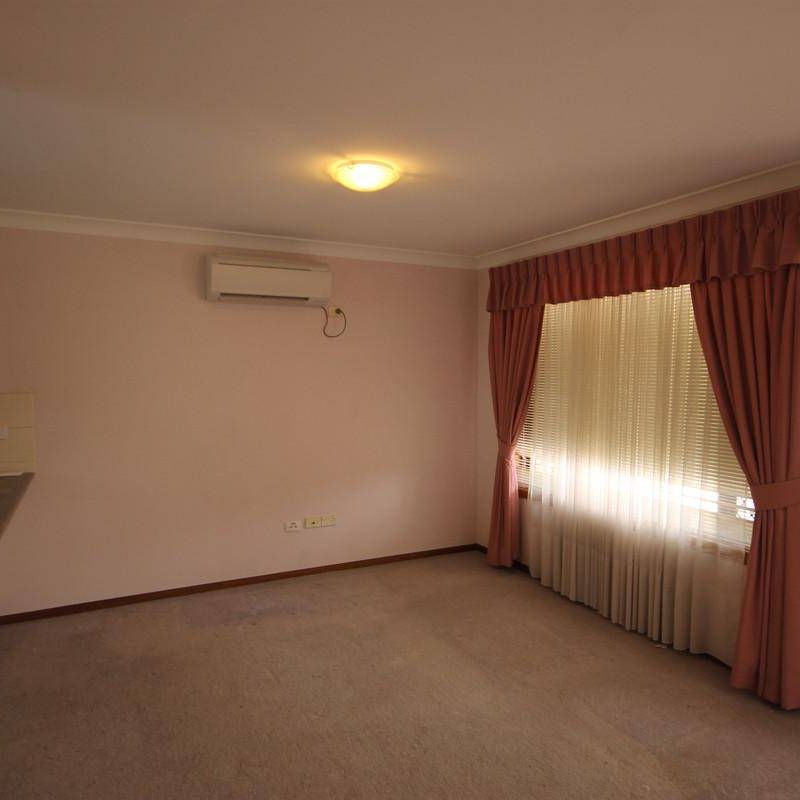 AIR CONDITIONED UNIT IN THE HEART OF TOWN - Photo 1