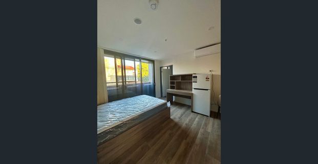 Brand New Fully furnished Studio -Light Rail at door - Photo 1