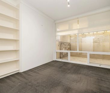 UNFURNISHED - Charming Solid-brick Home with Treetop Views - Photo 2