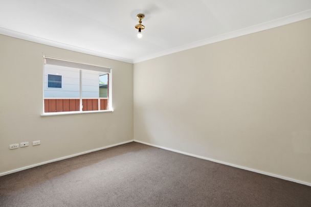 Peaceful Coastal Living Close to Shops & Beach - Photo 1