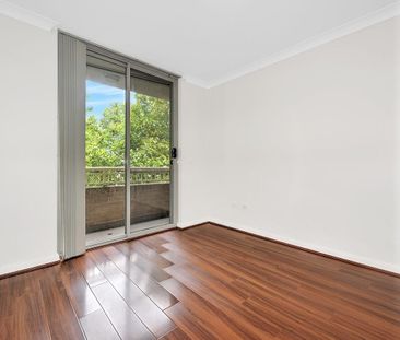 Spacious & Renovated Two Level Apartment - Photo 1