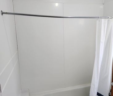 Step inside this self contained one-bedroom unit. - Photo 2