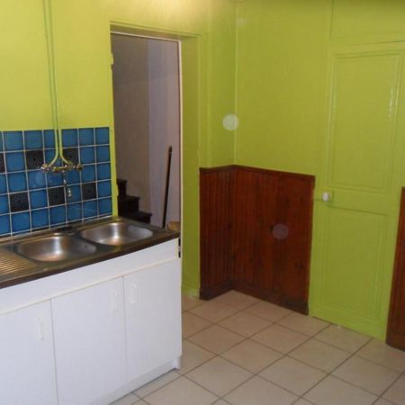 Une maison mitoyenne d'un côté située dans le Centre de Duclair - Photo 3