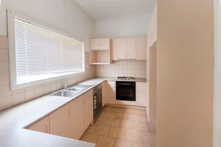 This beautifully presented, spacious three-bedroom home is ideally positioned in a highly sought-after location. - Photo 5