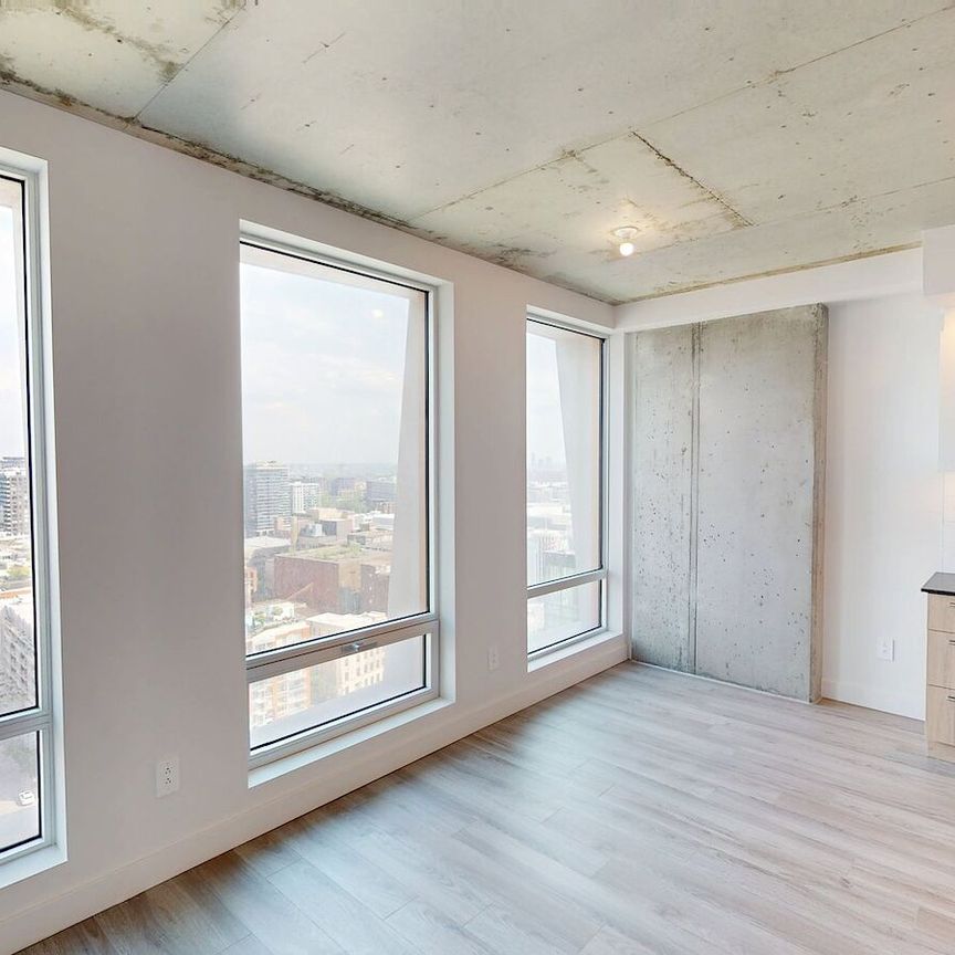 From bold architecture to sweeping skyline views, Skyla is where downtown Montréal living reaches its peak — in style - Photo 1