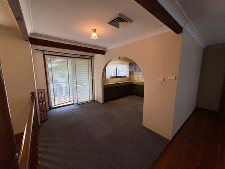 Spacious Family Home with Multiple Living Areas & Water Included - Photo 5