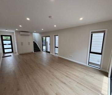 Brand New 4 Bedroom Home with Ensuite and Internal Access Parking - Photo 1