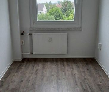 Hier fühlen Sie sich wohl: familienfreundliche 4-Raum-Wohnung! - Foto 4