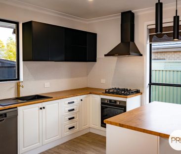 FRESHLY RENOVATED COMFORTABLE HOME - Photo 3