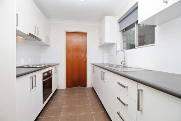 VALUE PACKED TWO-BEDROOM APARTMENT! - Photo 1