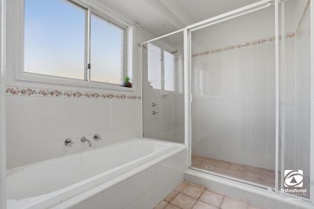 Charming Family Home Opposite Parklands in Sought-After Location - Photo 4