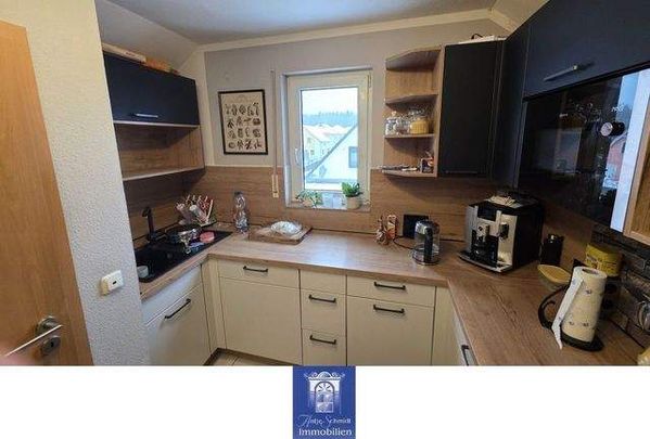 Gemütliche Dachgeschosswohnung mit Balkon in ruhiger Lage! - Foto 1