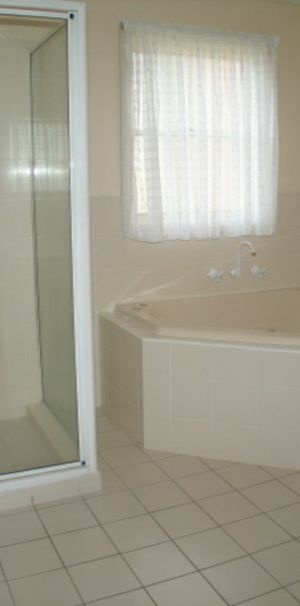 Split Level Two Bedroom Townhouse With Single Garage - Photo 1