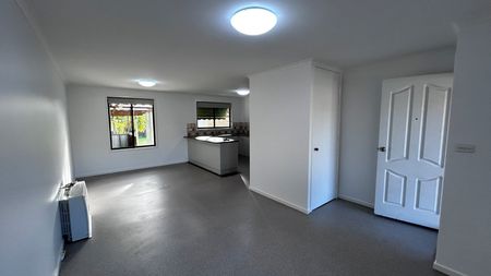 Freshly Painted, Neat Home in Fantastic Drysdale Location - Photo 2