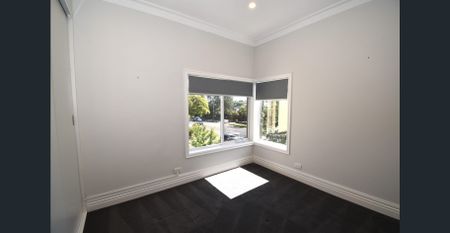 Sunlit Luxe Townhouse with Private Gardens & Premium Upgrades (Professional Garden Maintenance Included) - Photo 3