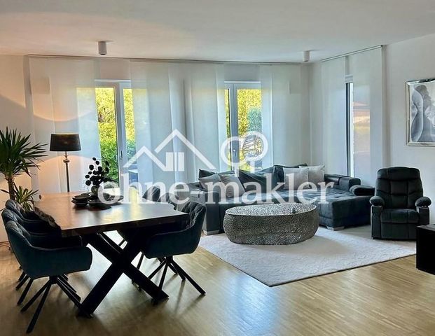 Attraktives Einfamilienhaus mit großer Terrasse und wunderschönem Garten - Photo 1