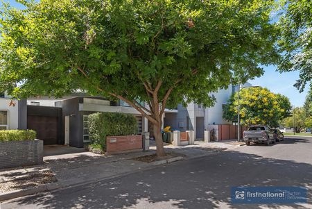 MODERN AND WELL APPOINTED IN CONVENIENT LOCATION - Photo 4