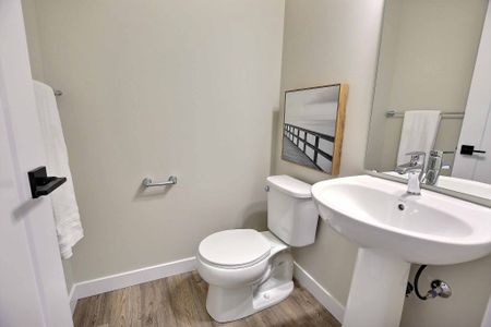 Chuka Boulevard – Three-Bedroom, One-and-a-Half-Bathroom - Photo 2