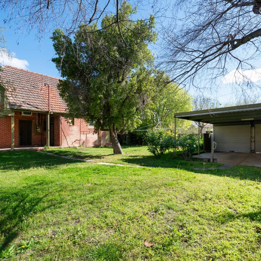 Character Bungalow in Prestigious Heathpool Locale - Photo 1