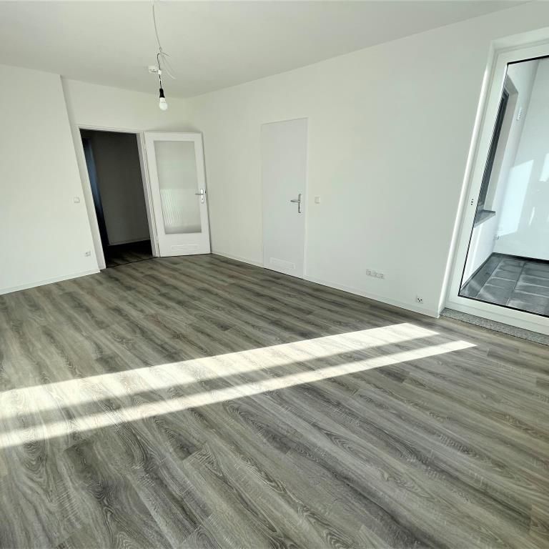 Moderne 3-Zimmer-Etagenwohnung mit Laminat und großem Balkon in Wolfsburg - Photo 1