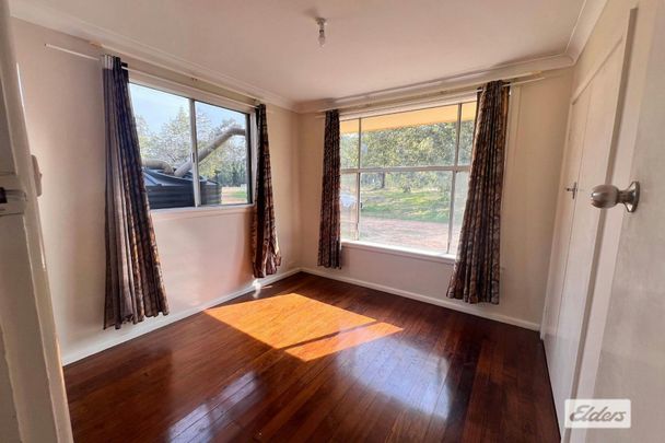Neat 3-bedroom Home Overlooking Farmland - Photo 1