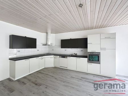 Appartement de 4.5 pièces au rez-de-chaussée - Photo 2