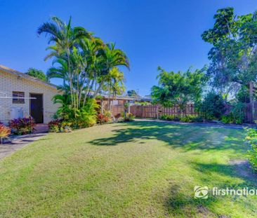 IMMACULATE BRICK HOME WITH SOLAR IN AVENELL HEIGHTS - Photo 1