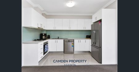 Chic 2-Bedroom Apartment in the Heart of Mount Annan - Photo 5