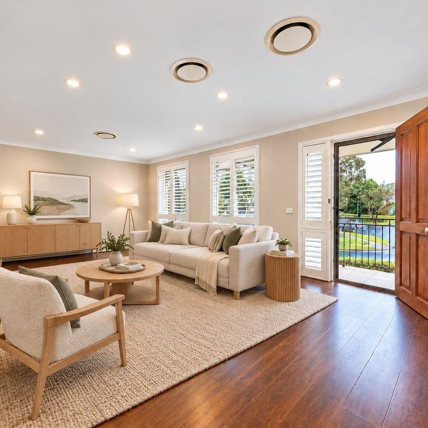 Spacious Four-Bedroom Family Home with Multiple Living Areas - Photo 1