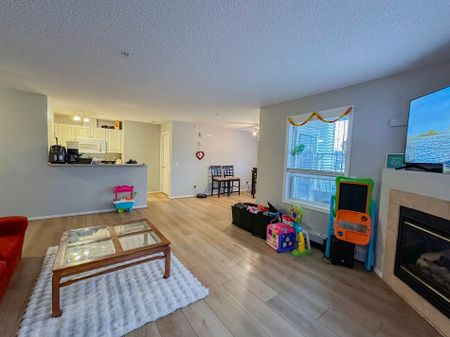 Spacious 2 Bed, 2.5 Bath Condo In Shawnessy | Fireplace, Balcony & Rent Incentive - Photo 5