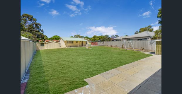 Secure Family Home in Tranquil Setting - Photo 1