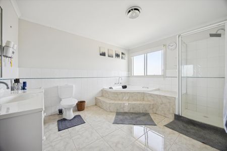 Secure Family Home with Solar & Multiple Living Zones - Photo 5